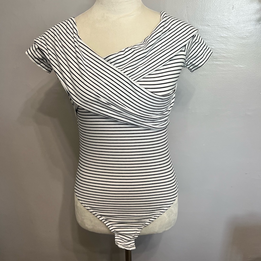 White and black stripped body suit